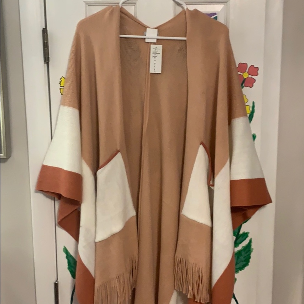 Pink poncho by harvé benard